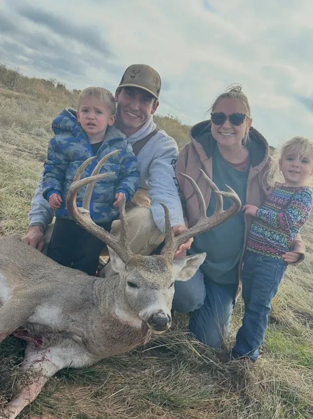 McClellan family with trophy buck on Texas ranch